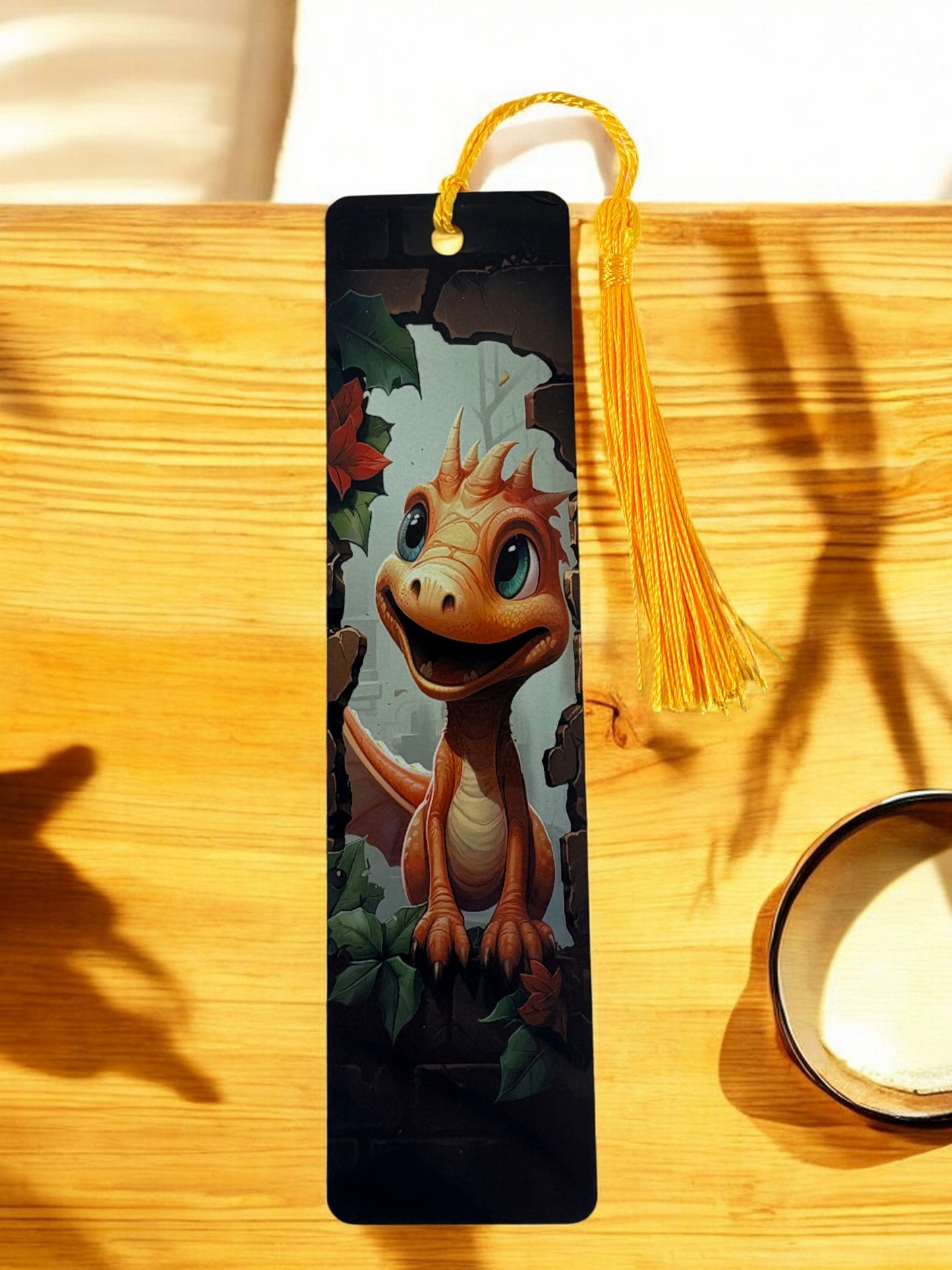 orange baby dinosaur bookmark
