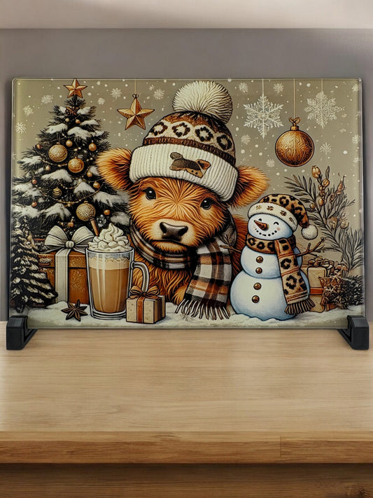 highland cow and snowman cutting board