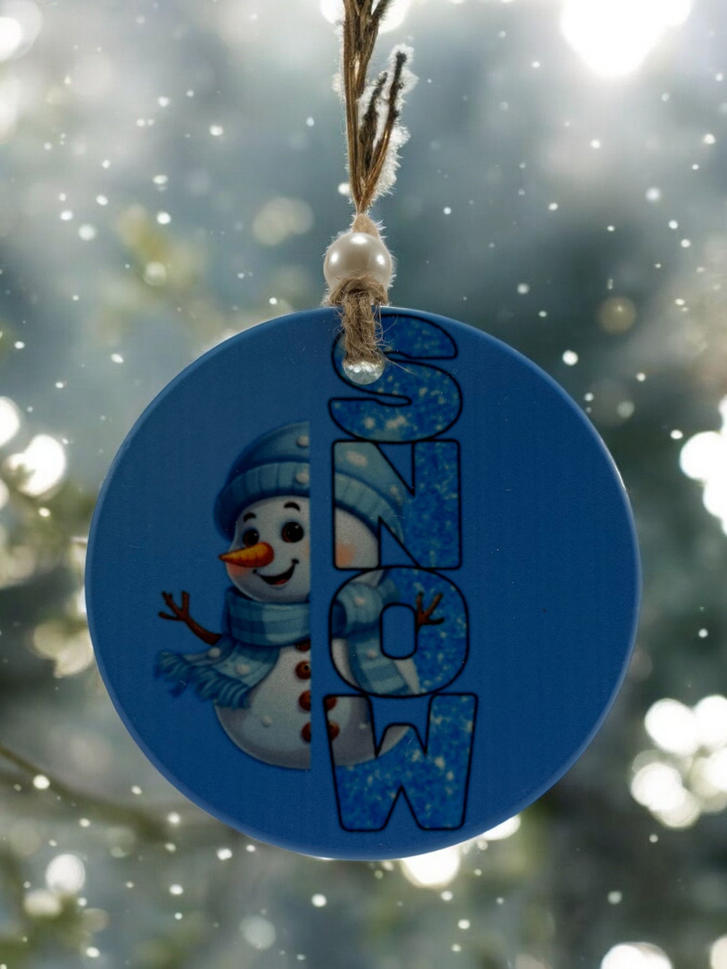 snow with snowman ornament